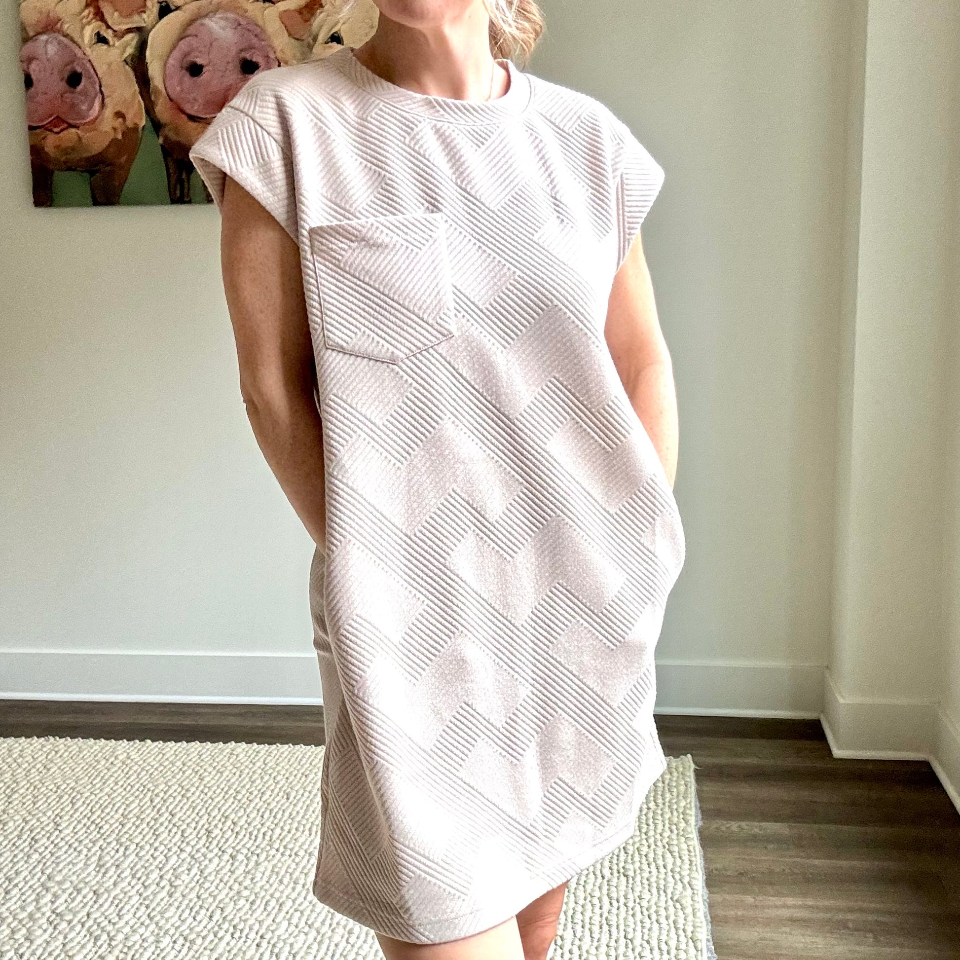 Tan short sleeve textured fabric mini dress with pockets