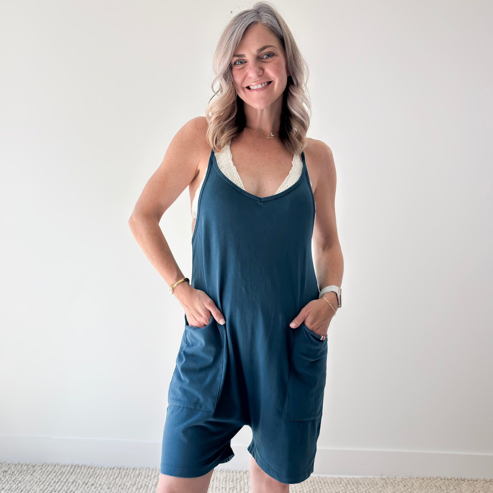 Women's washed blue easy knit short romper with pockets