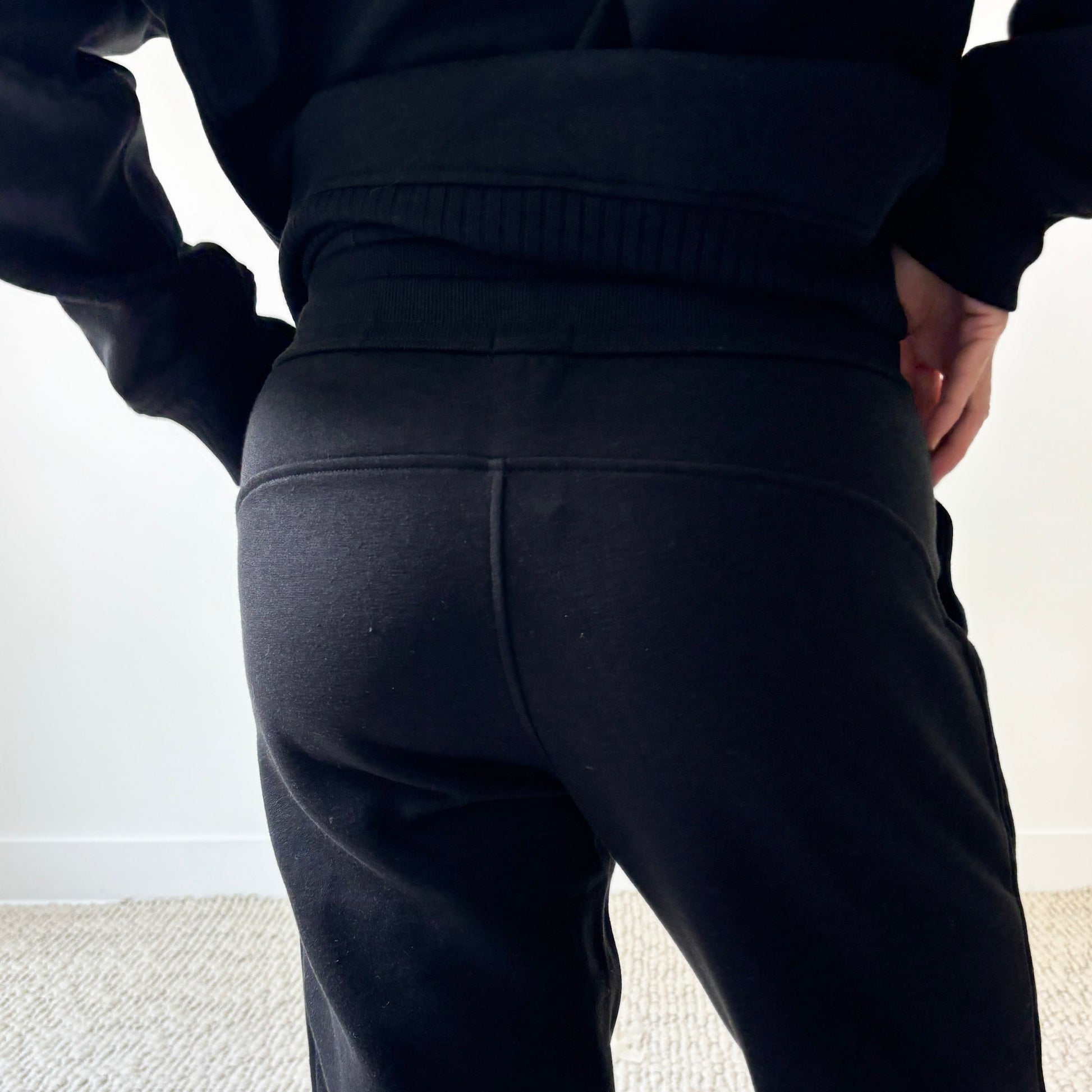 Women's black slim fit fleece jogger with just here for the après embroidery