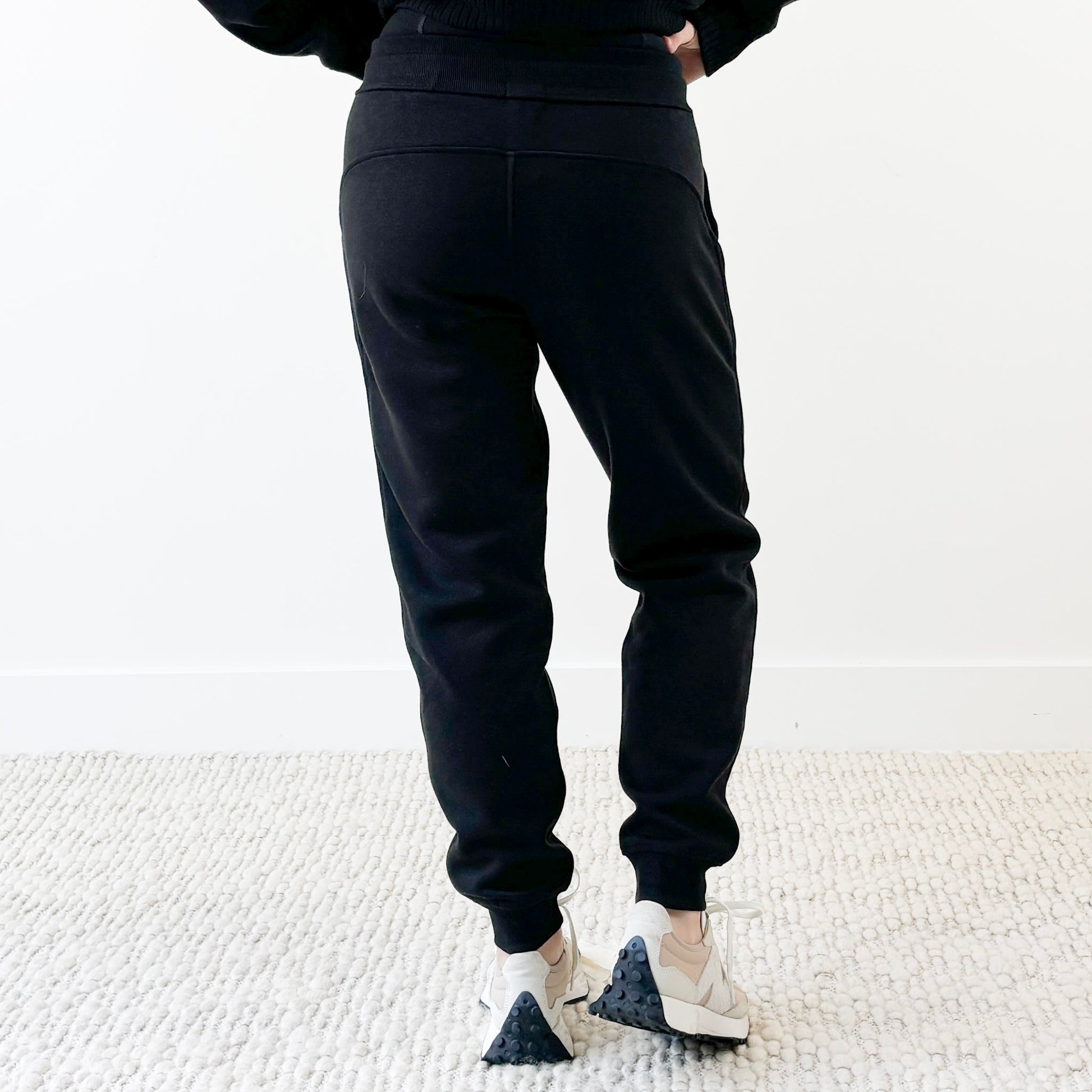 Women's black slim fit fleece jogger with just here for the après embroidery
