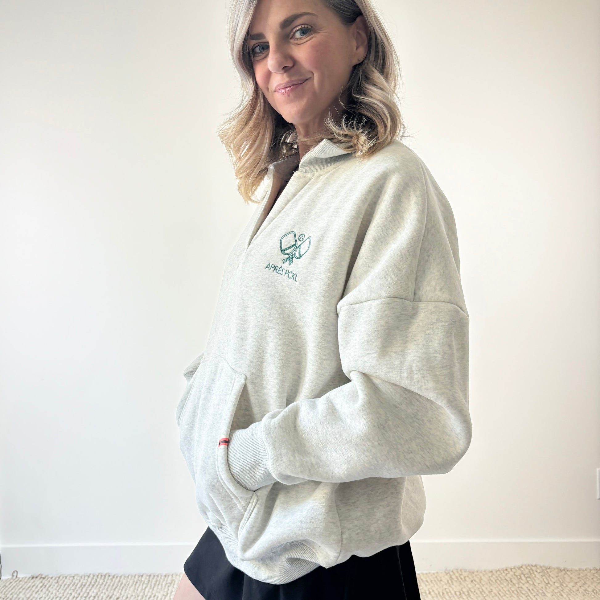 Heather oatmeal oversized collared sweatshirt with après pckl pickleball paddle embroidery