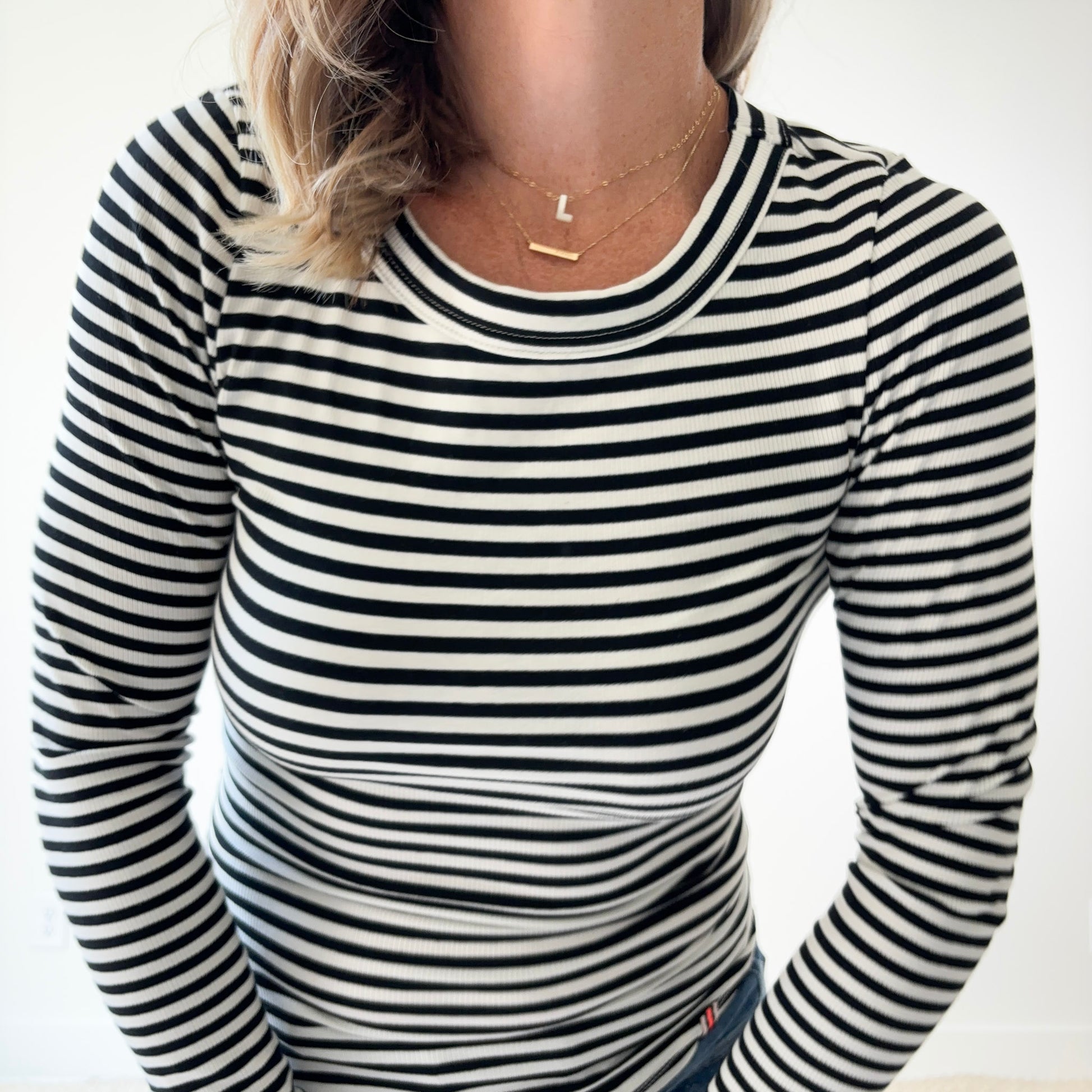 Women's long sleeve fitted black and white stripe crew neck top
