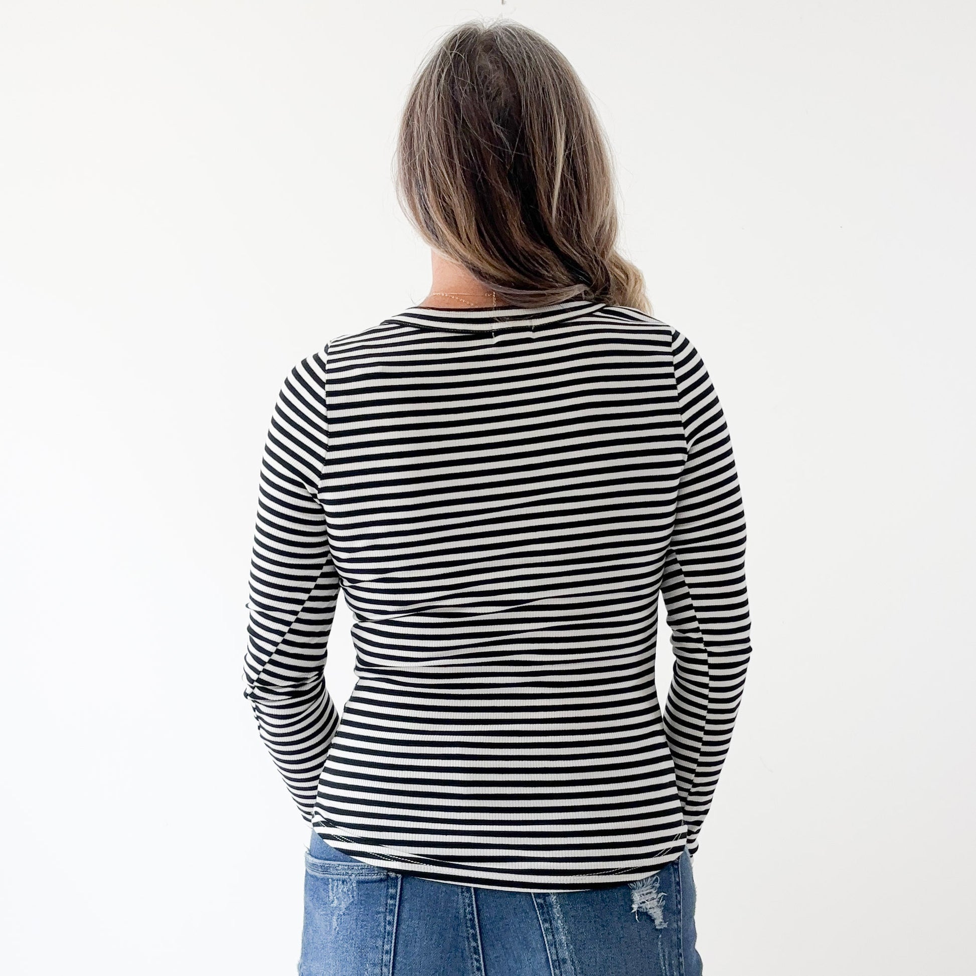 Women's long sleeve fitted black and white stripe crew neck top