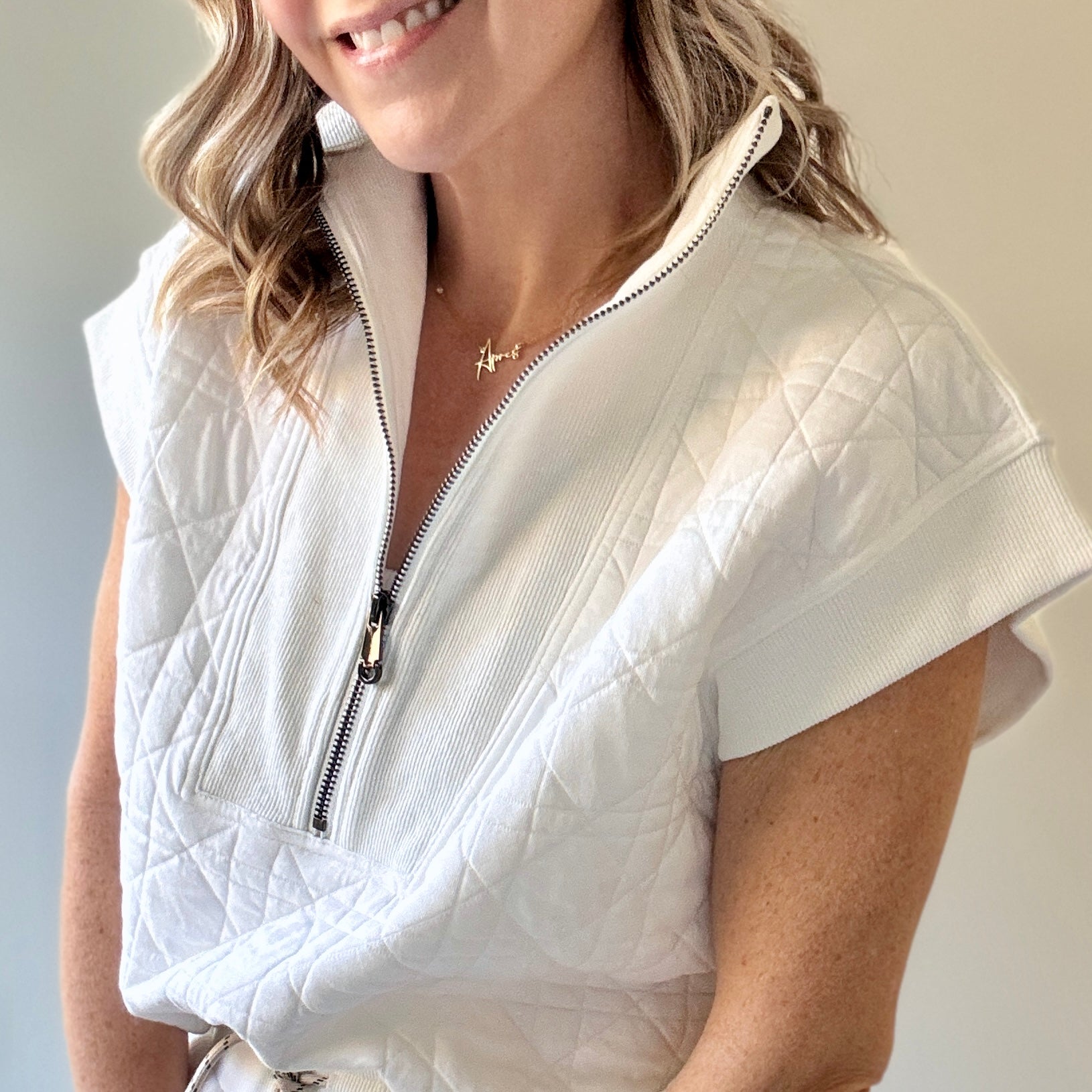 Women's preppy white textured quarter zip top with ribbed trim
