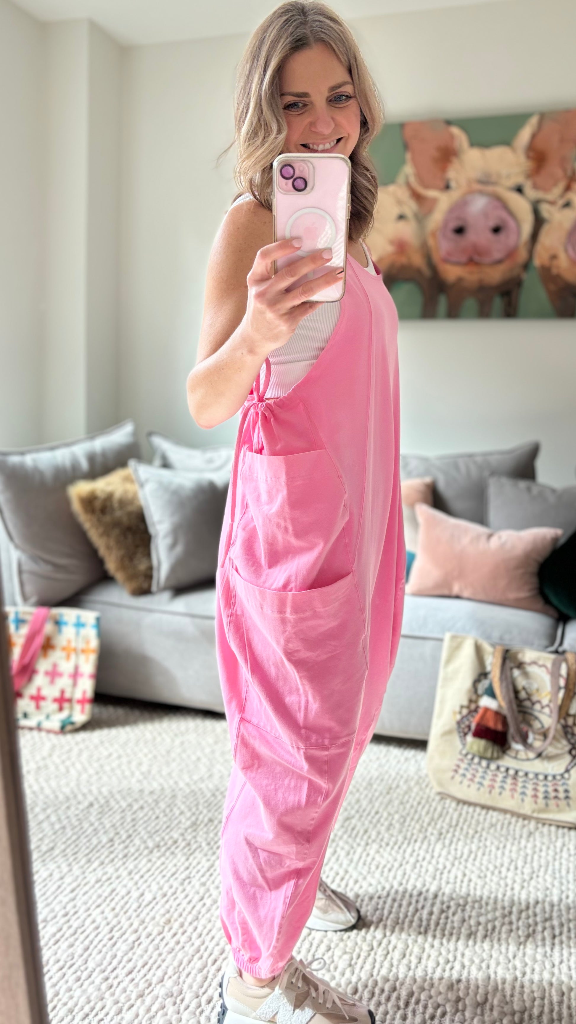 Women's Pink Knit Tank jumpsuit romper with cargo pockets side ties and gathered elastic hem