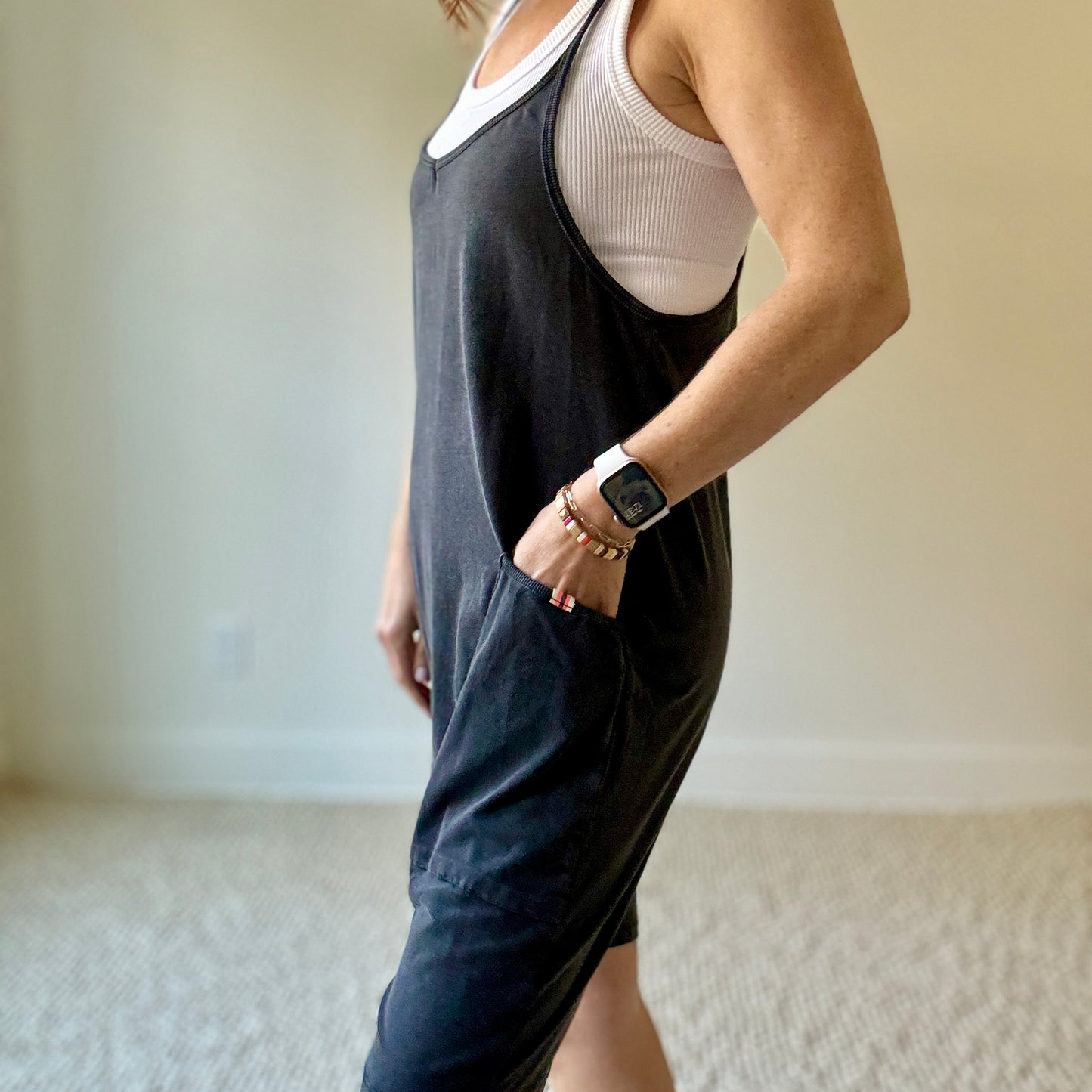 Women's washed black easy knit short romper with pockets