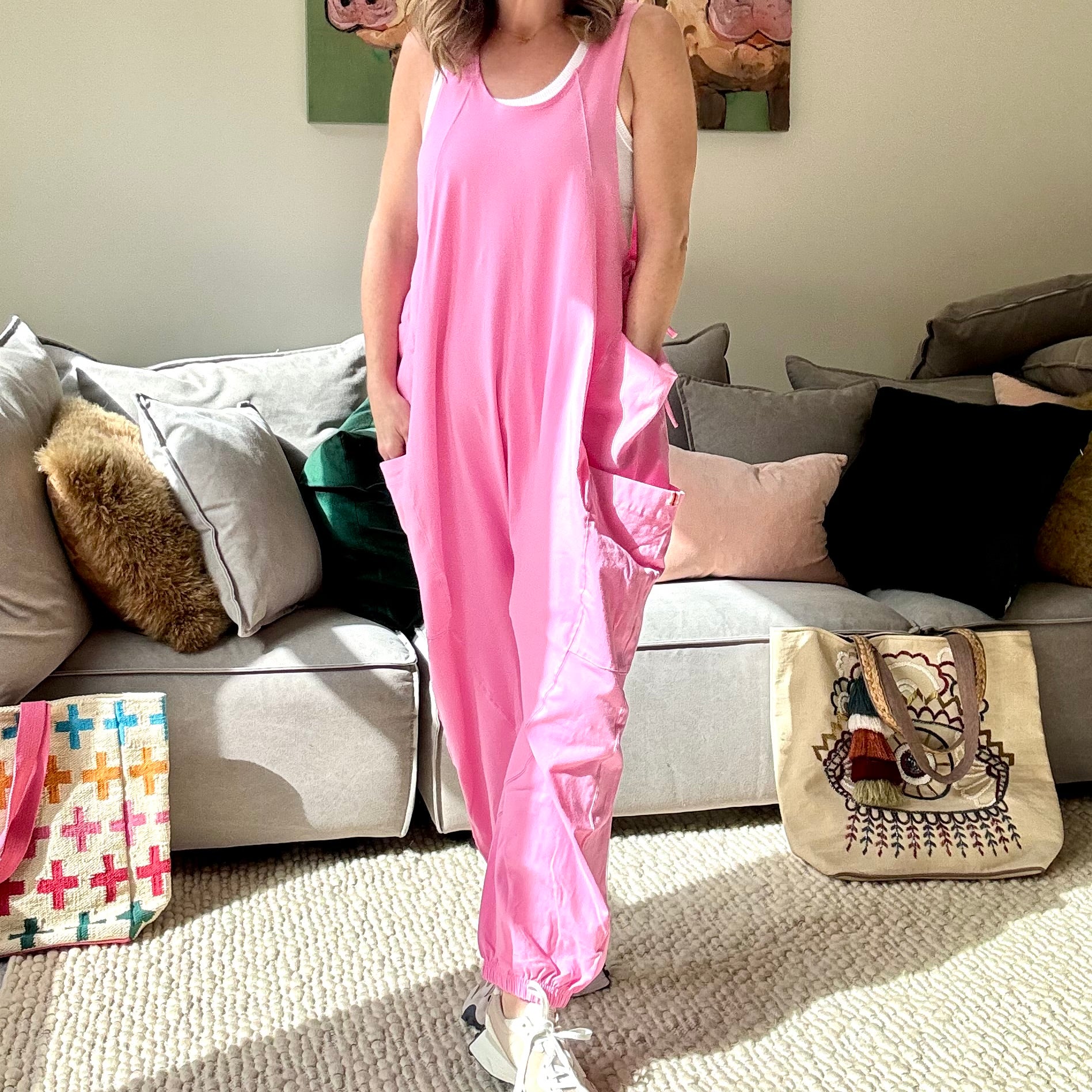 Women's Pink Knit Tank jumpsuit romper with cargo pockets side ties and gathered elastic hem