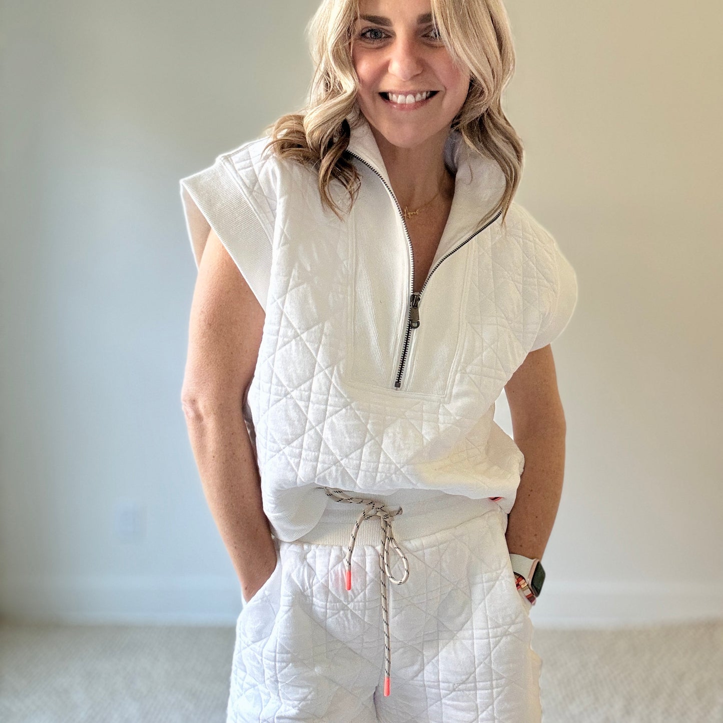 Women's preppy white textured quarter zip top with ribbed trim