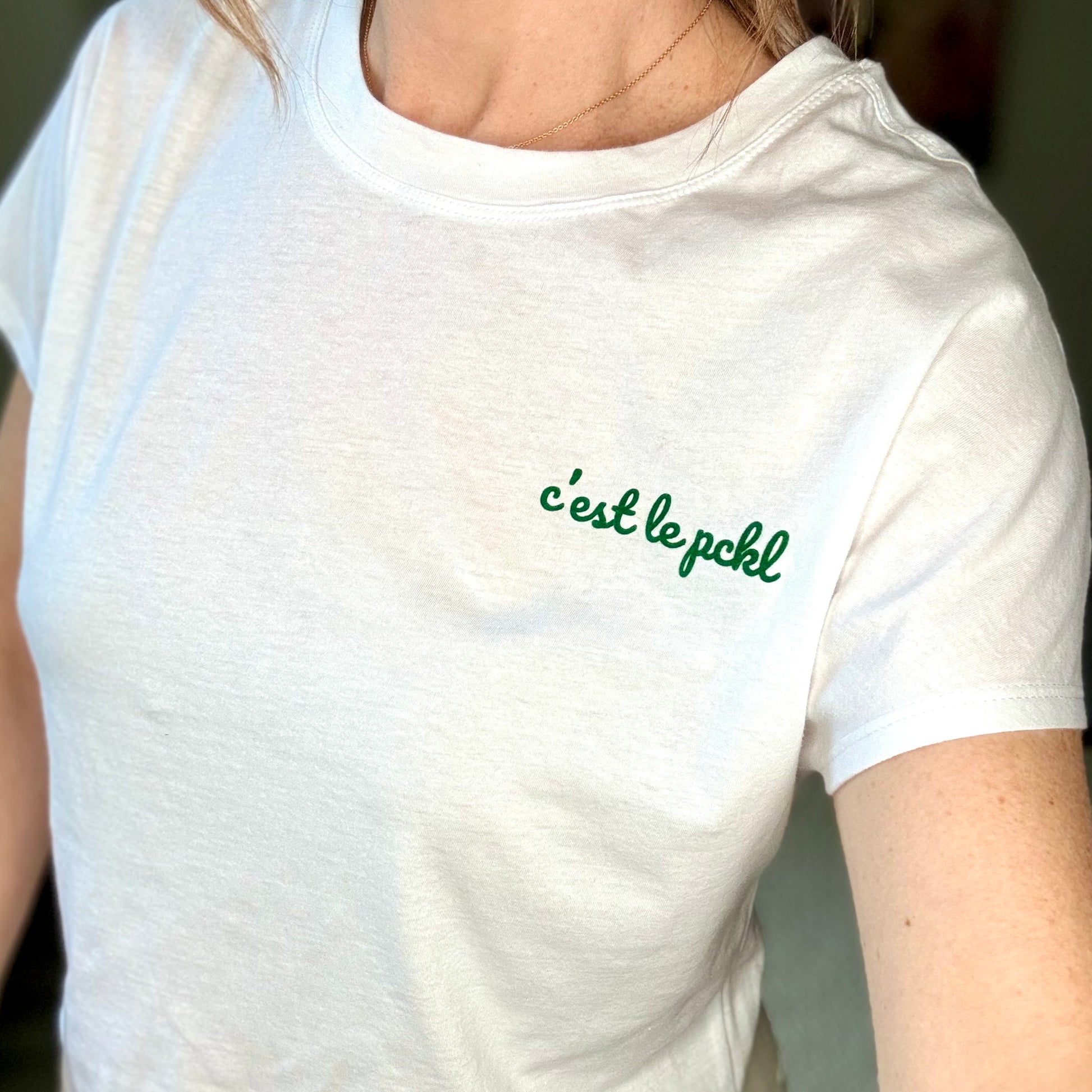 White short sleeve ultra soft t-shirt with green c'est le pickleball left chest graphic